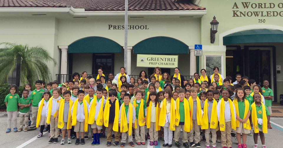 Students in front of the school