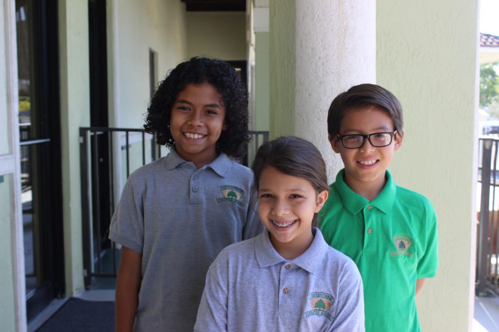 Three Greentree students in uniform